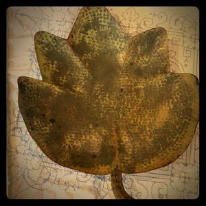 Decorative metal leaf. Can be used as a bowl